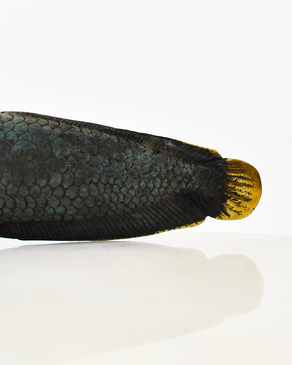 Close Up Of The Brass ues Featured On The Bronze Arowana Ornament
