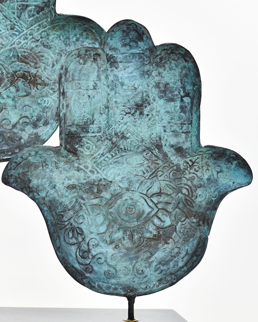 Close Up Of The Intricate Details On The Bronze Ancient Amulet Sculpture