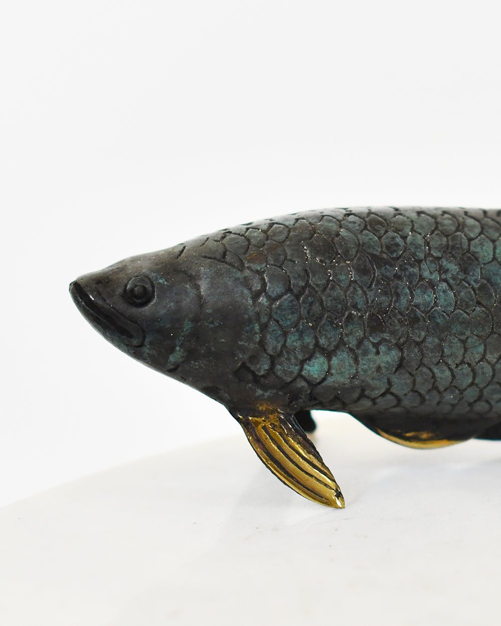 Closse Up Of The Bronze Arowana Ornament