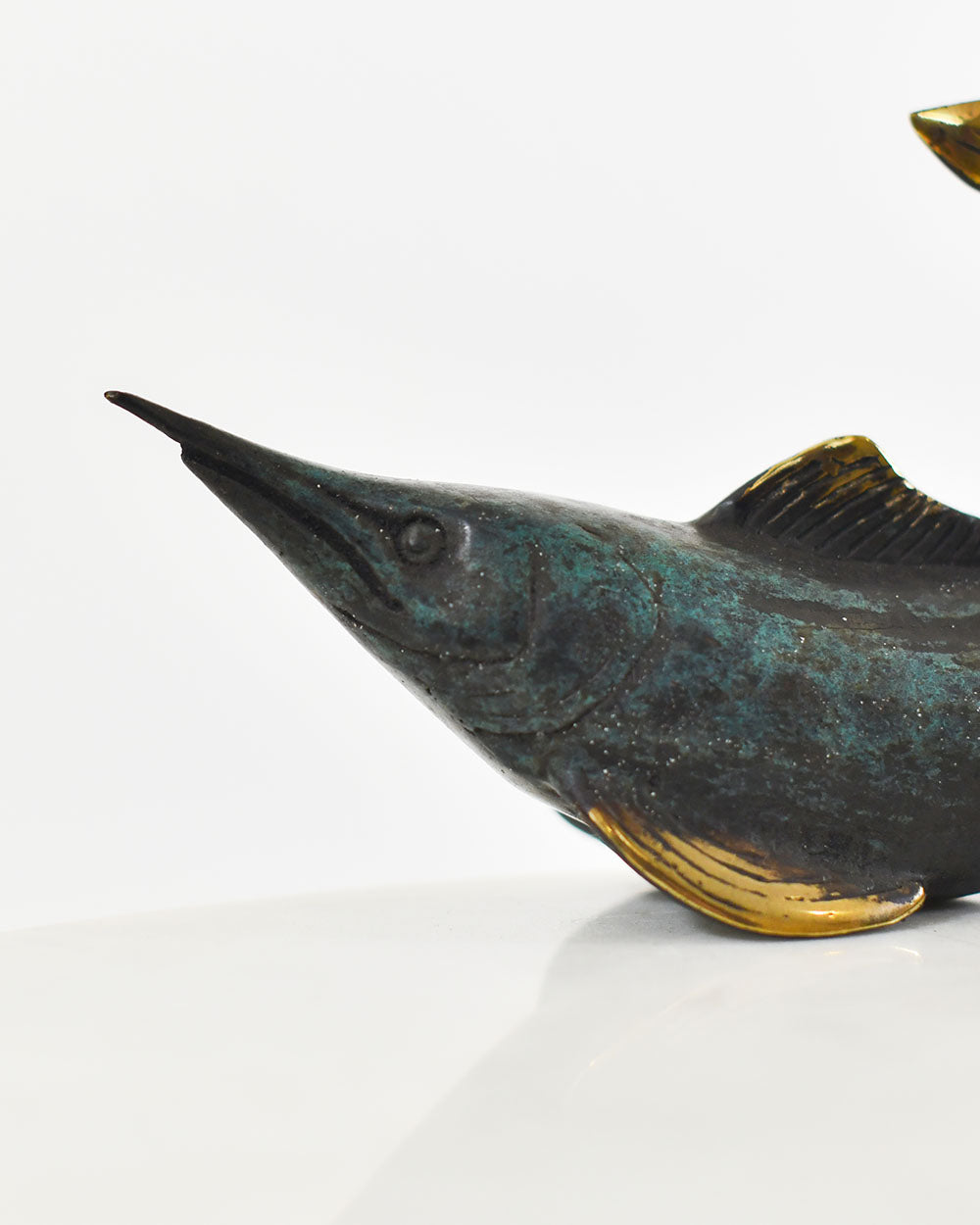 Close Up Details Of The Bronze Breaching Voyager Marlin Decoration