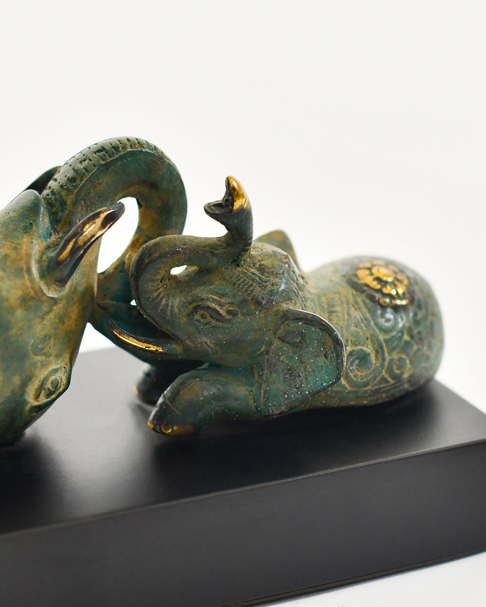 Close Up Of The Intricate Details From The Bronze Gilded Acrobat Elephants