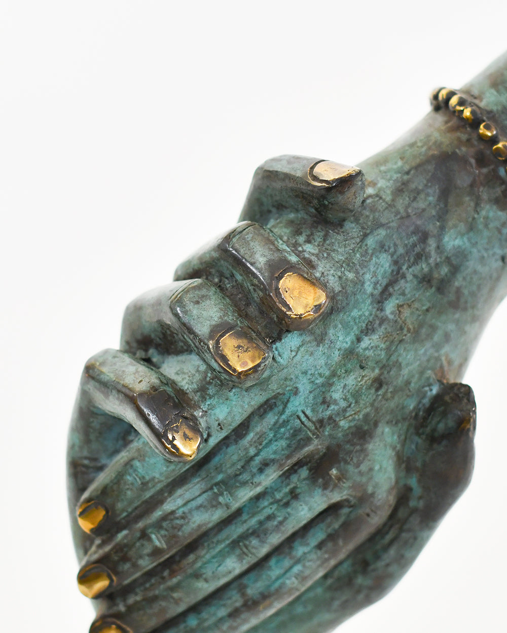 Close Up Of The Bronze Kindred Hands