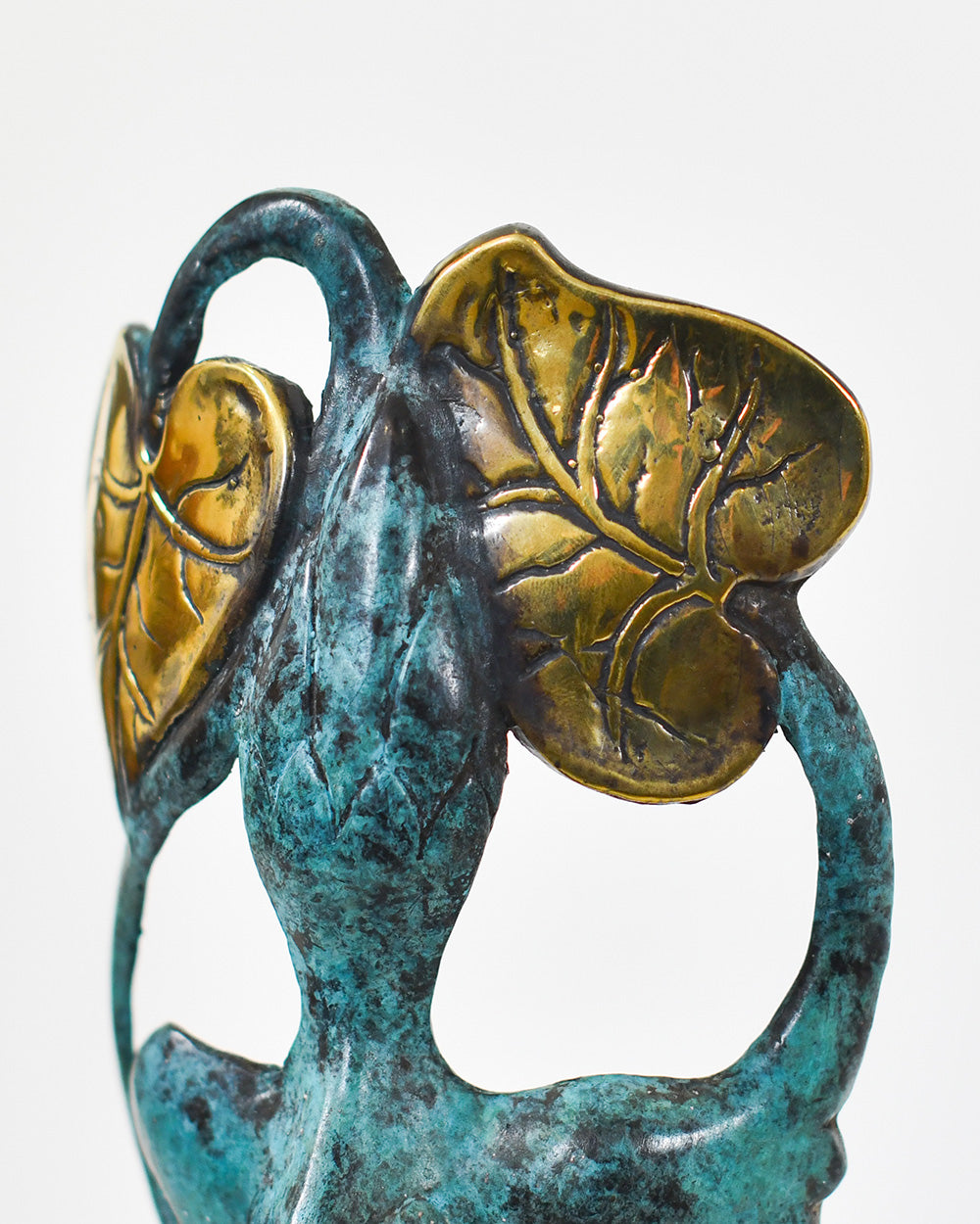 Close Up Of The Intricate Details On The Bronze Mask Ornament 