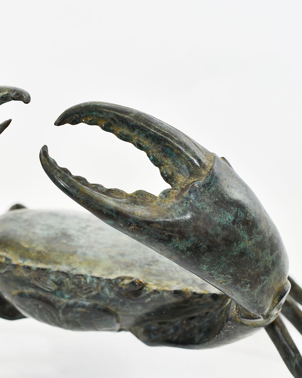 Close Up Of The Verdigris Finish On The Crab Home Ornament