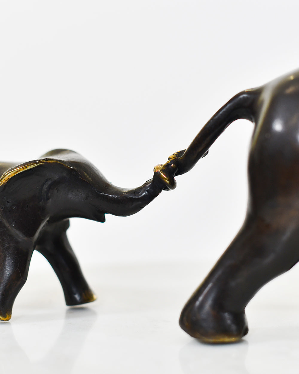 Close Up Of The Brass Highlights From The Elephant Family Ornament