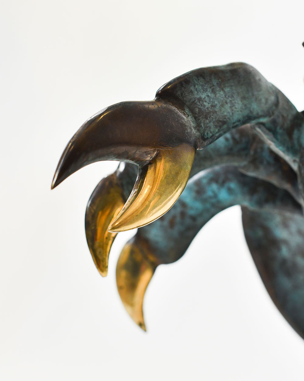 Close Up Of The Brass Hues On The Hermit Crab Home Ornament