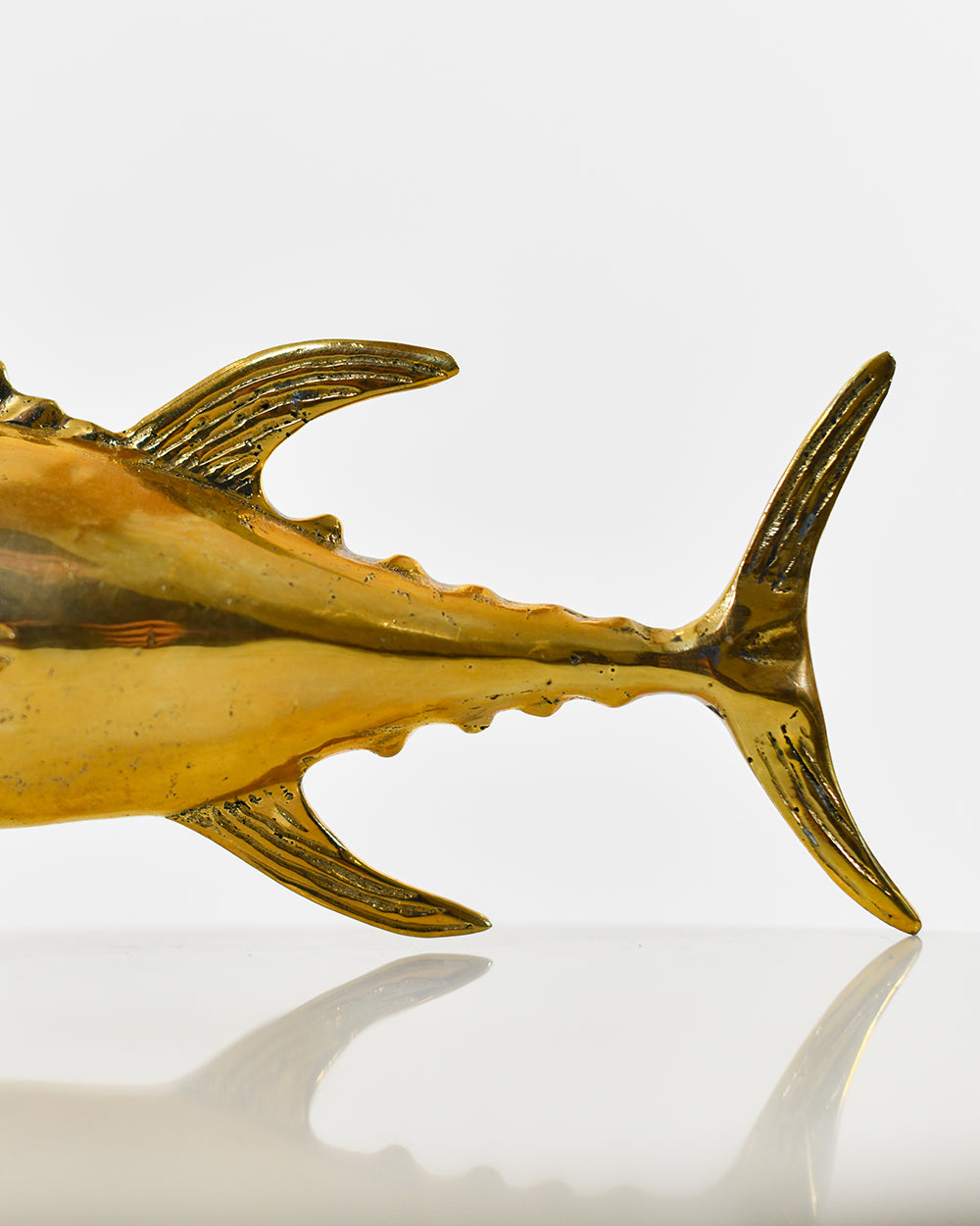 Polished Gold Finish On The Ornate Tuna Home Ornament